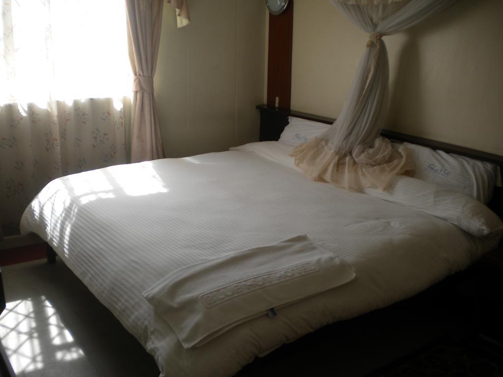 Blue Hut Hotel Nairobi Chambre photo