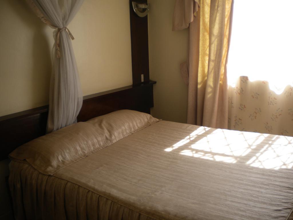 Blue Hut Hotel Nairobi Chambre photo